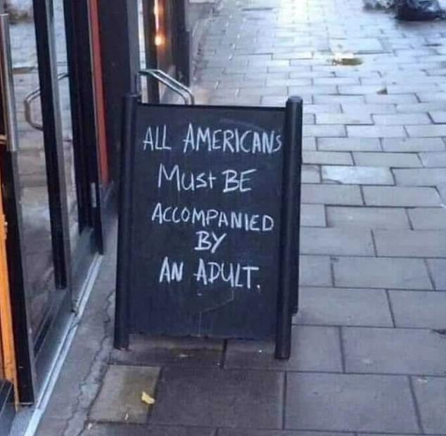 This sign warning Americans that they must be accompanied by an adult was seen outside a cafe in Clerkenwell, London.