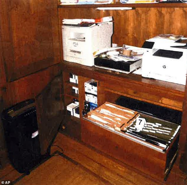 This image, contained in special counsel Robert Hur's report, shows notebooks in a filing cabinet under a printer that were seized at President Joe Biden's first-floor headquarters in Wilmington, Delaware, on Jan. 20, 2023, during a search by FBI agents