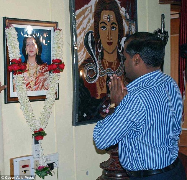 Paying his respects: Deputy Commissioner pauses for reflection at Savita shrine