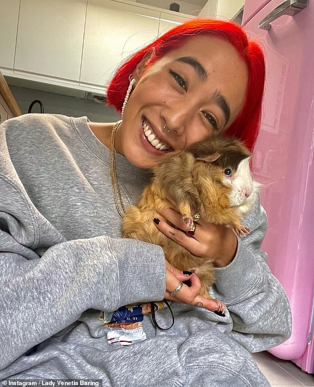 In her online portfolio, Venetia says she runs a workshop called Divurgente for creatives. In the photo with his guinea pig