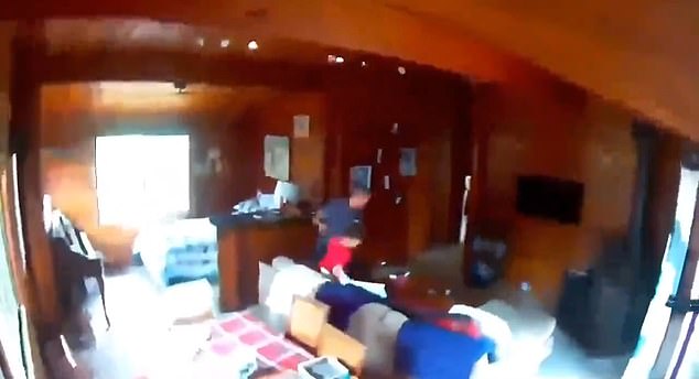 Stunning footage captured the moment the earthquake violently shook a house in Hawaii, prompting a man and boy to run frantically to escape.