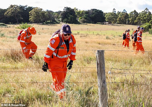 SES volunteers search for clues near Buninyong as part of a large-scale search for missing Ballarat East woman Samantha Murphy; the search has now been significantly reduced