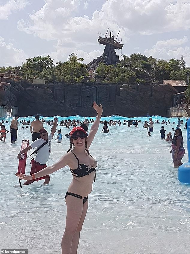Who said saving lives can't be great? A lifeguard strikes the perfect pose at Disney's Typhoon Lagoon