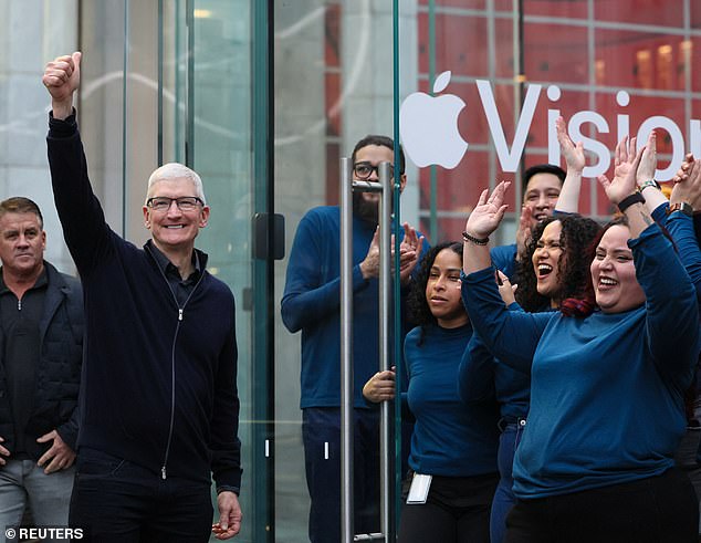 Apple CEO Tim Cook arrived at Apple's flagship store in Manhattan this morning for the event and greeted early birds waiting in line before the doors opened.