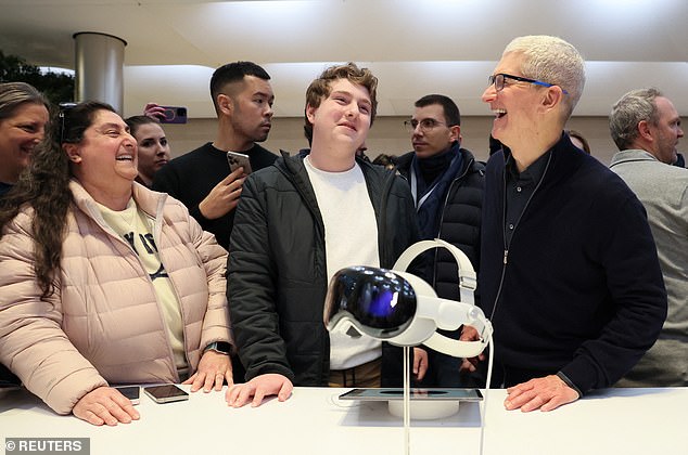 Cook spoke with customers at the New York store that was packed with people hoping to try out the Vision Pro headphones.