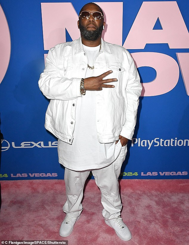 Killer Mike stood out in an all-white outfit that consisted of a denim jacket over a T-shirt, along with jeans and Nike sneakers.
