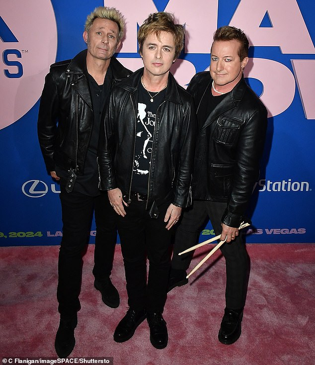Green Day members Mike Dirnt, Billie Joe Armstrong and Tre Cool opted for leather jackets and matching pants and shoes.