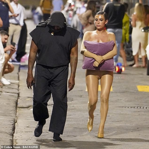 In the Halloween photo, Sharon could be seen as she stripped down to copy Bianca's infamous topless cushion look from September 2023 (Kanye and Bianca in the September 2023 photo).