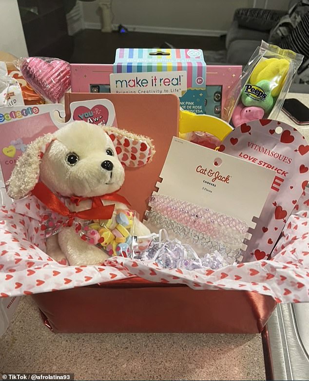 The American showed the gift basket she had put together, which included candy, a notebook, chocolate, a mask, a teddy bear and more.