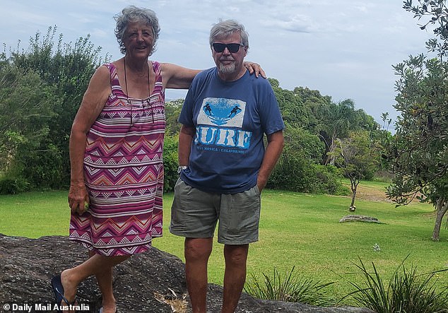 Lesley and Colin Brown have tended and cleared the land (above) outside their back door, keeping it free of snakes and cuts, but fear they will now be locked out of the quiet plot.