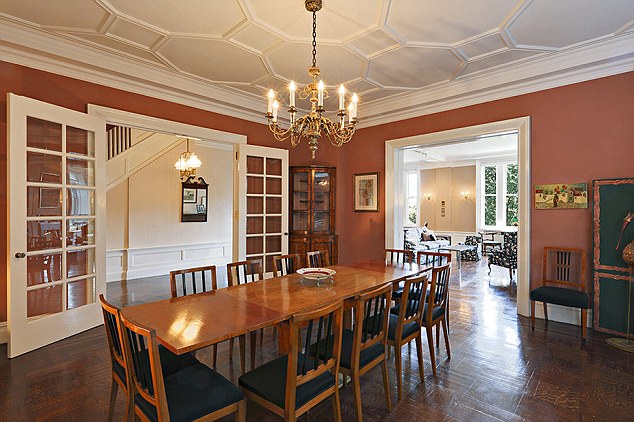 The dining room of the duplex nicknamed by one of his children as 'red nail'