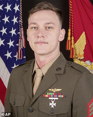 Sergeant. Alec Langen, 23, from Chandler, Arizona, CH-53E crew chief