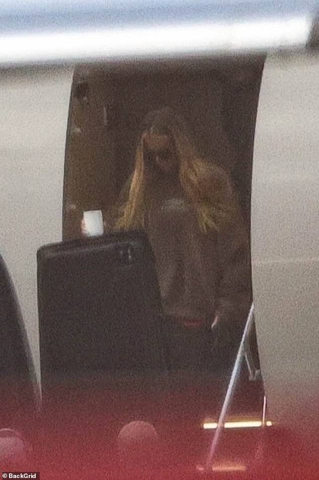 Like her siblings, Khloé dressed for comfort in an oversized crewneck sweatshirt.