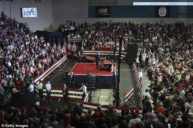 Trump arrives on stage during a Get Out The Vote rally at Coastal Carolina University on February 10, 2024 in Conway, South Carolina.