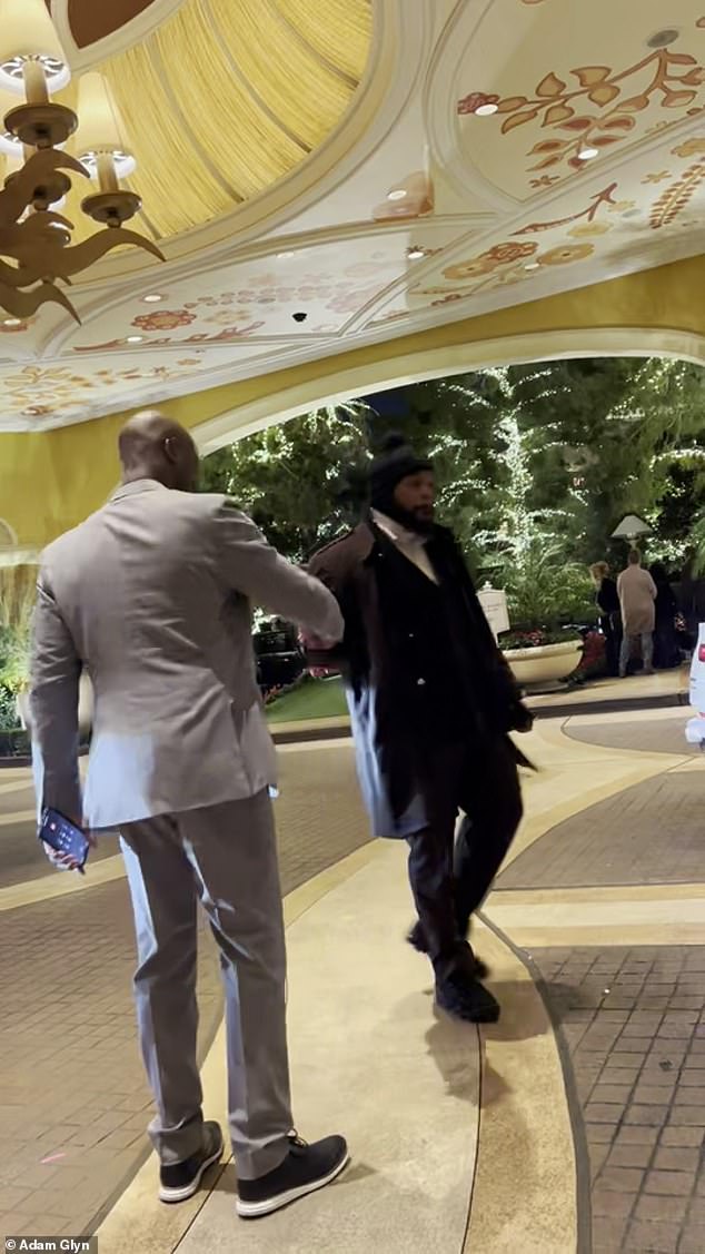 Peterson shook the hand of a hotel employee as he was led to a taxi to return home.