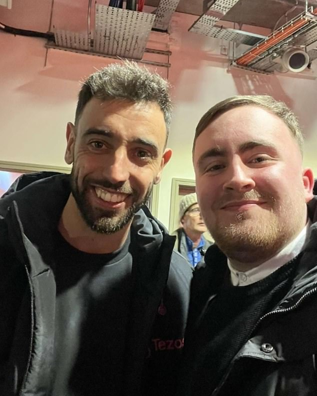 Littler also posed for a photo with Manchester United captain Bruno Fernandes at Old Trafford.