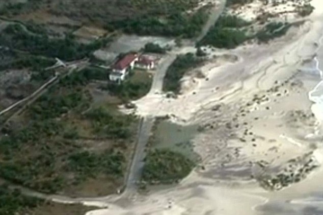 Permanent damage: the coast has been breached, with flattened dunes, washed out beaches and eroded coastline.