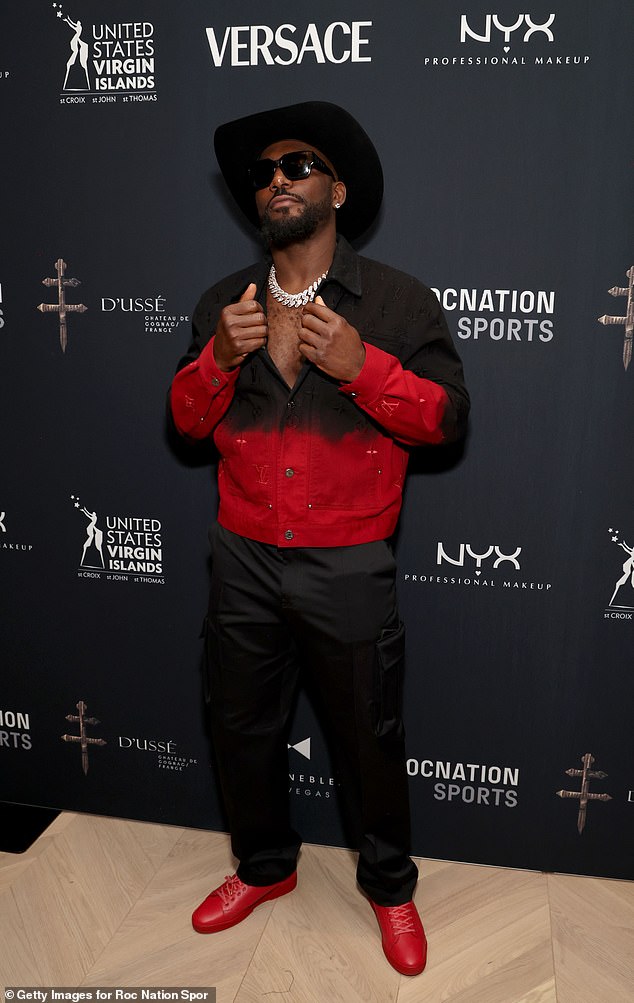 Bryant sported a black and red jacket and a black cowboy hat.
