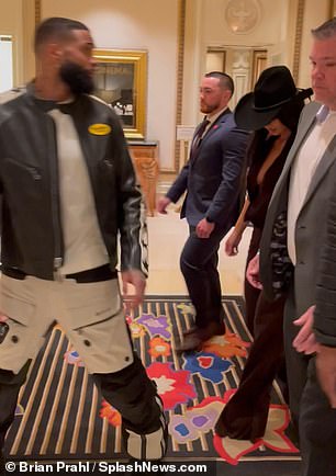 Odell was seen wearing a pair of black and white pants, as well as a matching leather jacket.