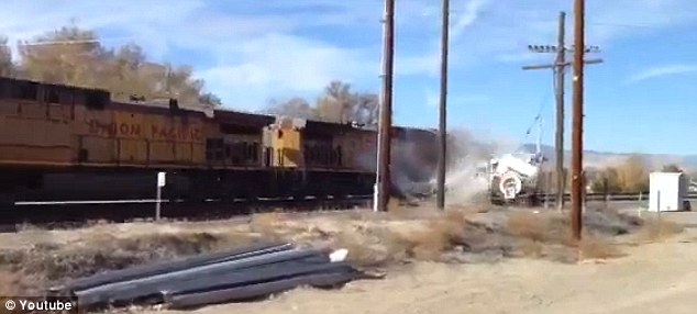 The train collides with the truck