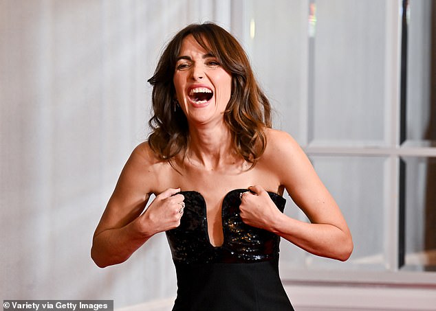 The Australian actress was delighted to appear at the star-studded event and was seen bursting into laughter before taking to the carpet.