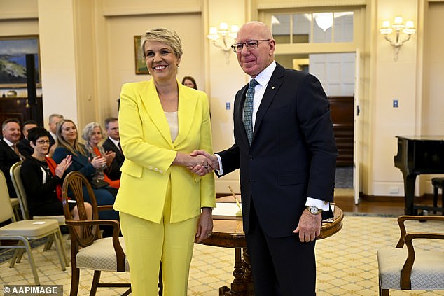 Environment Minister Tanya Plibersek shakes hands with Australian Governor-General David Hurley.