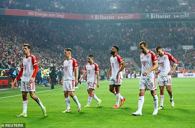 The Bayern Munich players left the field of play at the BayArena dejected at the end of time.
