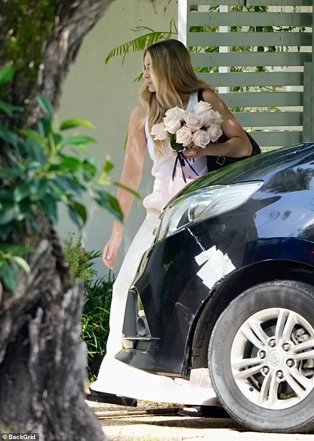 Margot looked radiant as she got out of her vehicle.