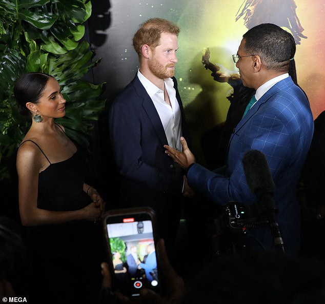 The Duke and Duchess of Sussex turned heads as they posed for photos and shook hands with actors last night.