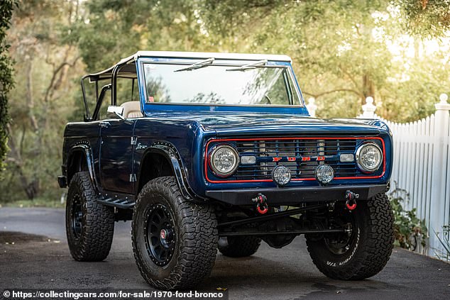 Button put the dark blue automatic custom truck up for sale on a website called Collecting Cars in January 2022.