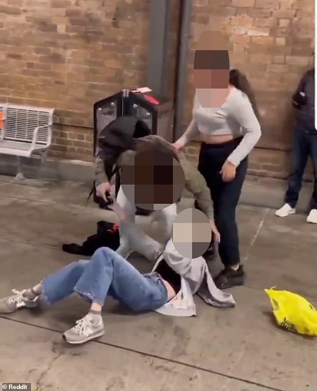 At one point in the footage, four girls are seen allegedly hitting, grabbing and pulling the hair of several women, causing one of them to fall to the ground.