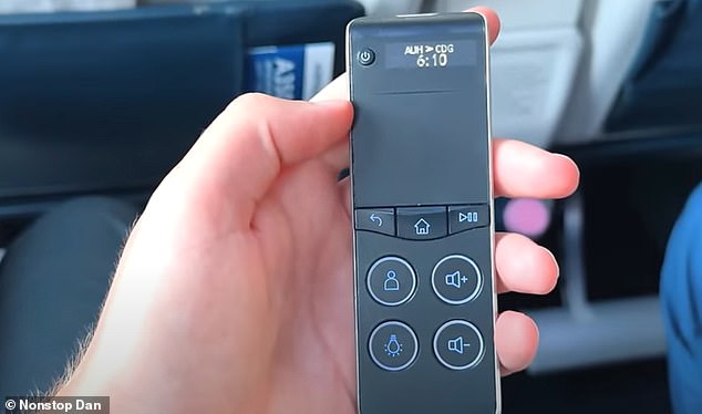 Passengers in premium economy class have a remote control for some of the seat functions.