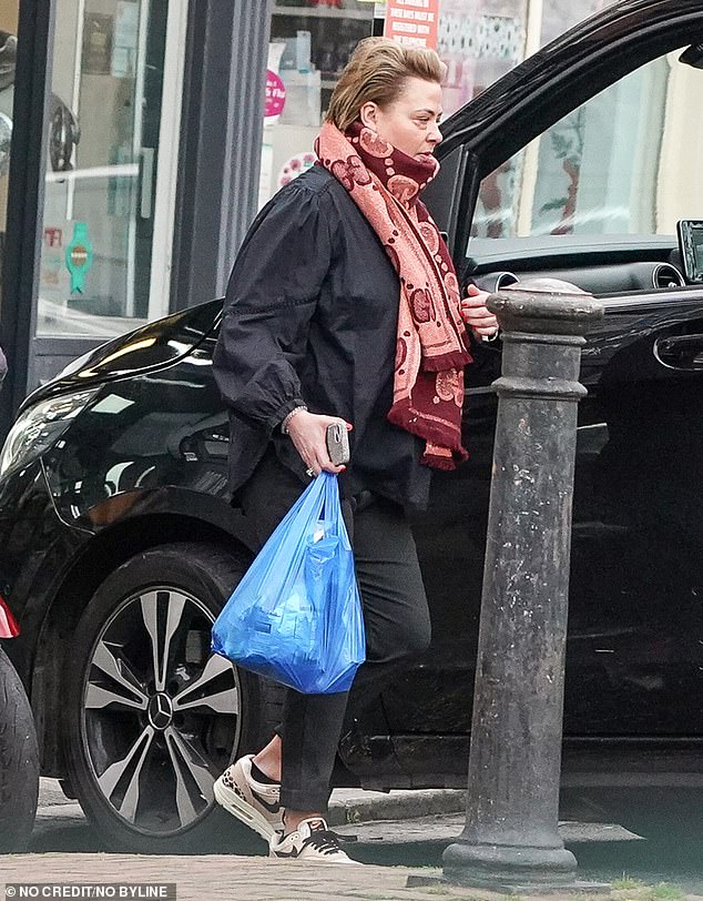 The Strictly makeup artist, 47, who was married to Ant, 48, for 11 years before divorcing in 2018 without having children, was spotted in west London doing some shopping.