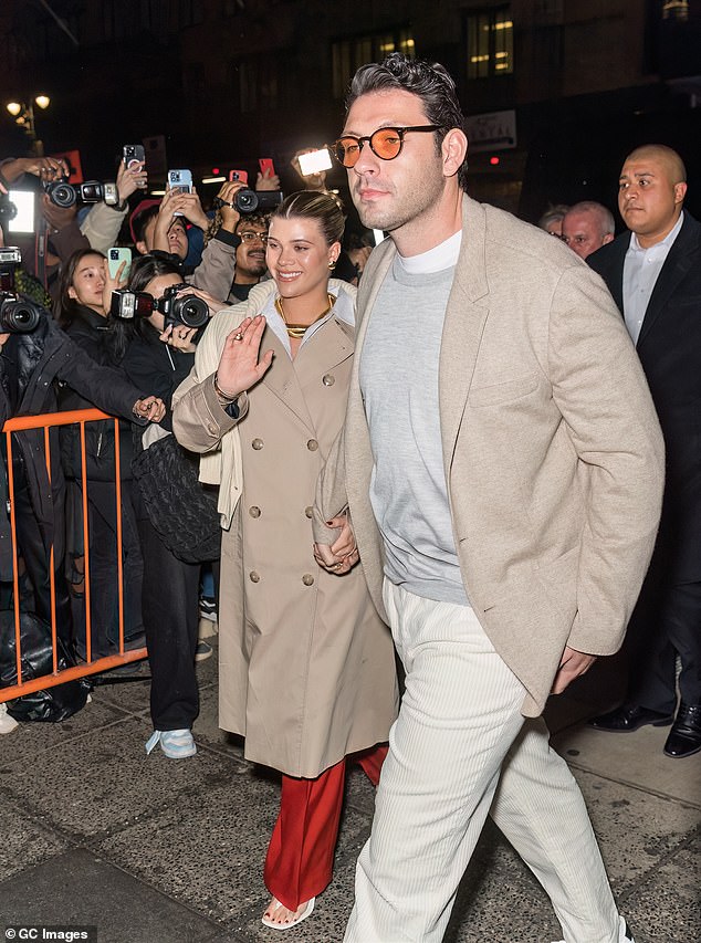 Richie is seen with her husband Elliot Grainge arriving at the Tommy Hilfiger fashion show.