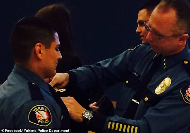 Huizar received his badge in December 2014 from Yakima Police Chief Dominic Rizzi.