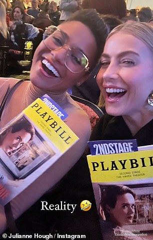 The two shared snaps as they posed with their signs while anxiously waiting for the curtain to rise.