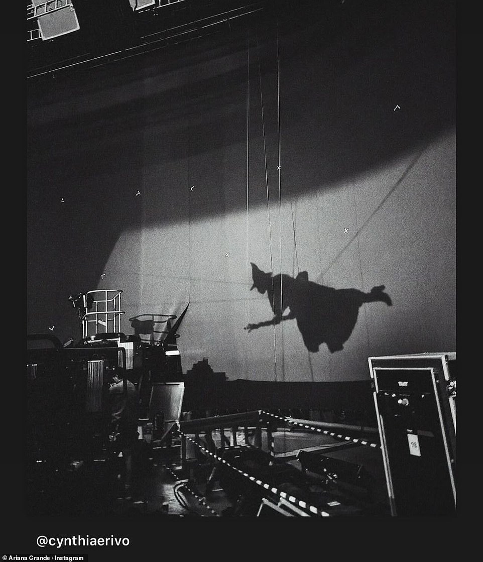 A black and white silhouette photo was shared last month, highlighting Cynthia flying through the air while Elphaba