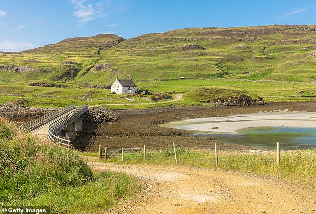 The population of Canna peaked at 436 in 1821, but following the clearing of the highlands in 1860 the number was reduced to 127. It is now around 20. Pictured: the island's Sanday Bridge