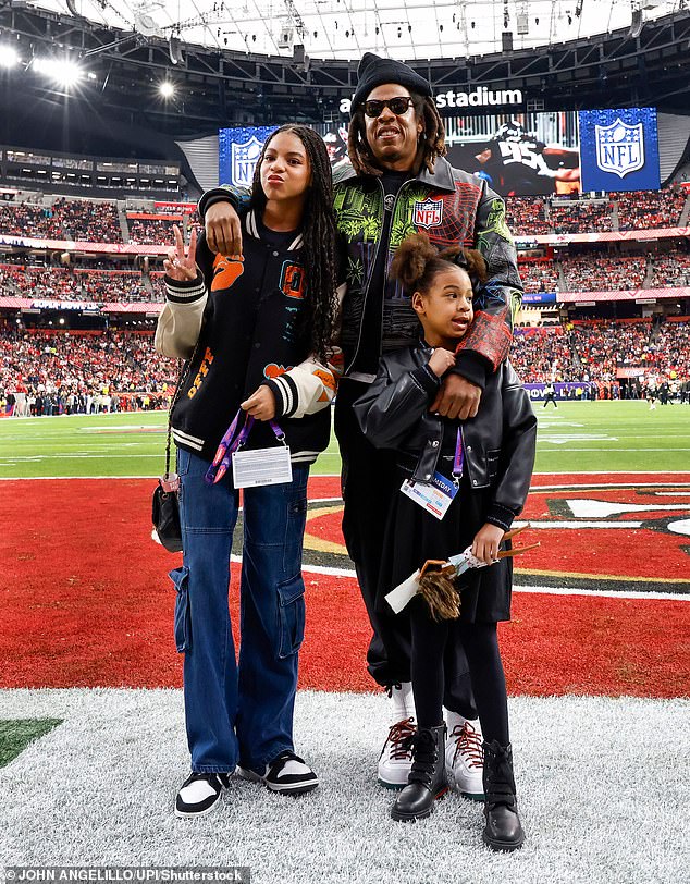 He was photographed posing for photos with his daughters at various locations on the field, including the end zone.