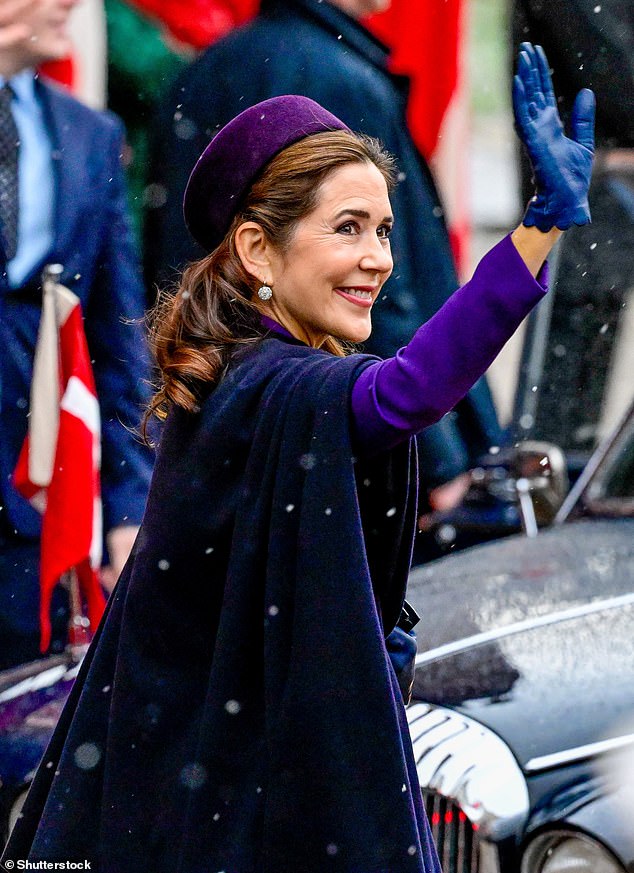 Tasmanian-born Queen Mary chose a purple tailcoat and navy wool shawl for the service celebrating the new king's reign, following his official coronation last Sunday.