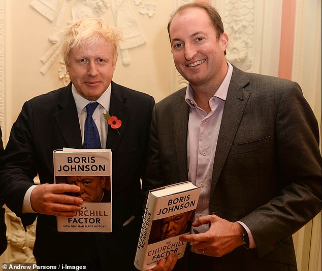 Boris Johnson (left) with former Number 10 communications director Guto Harri (right) at the launch of the politician's book The Churchill Factor in 2014.