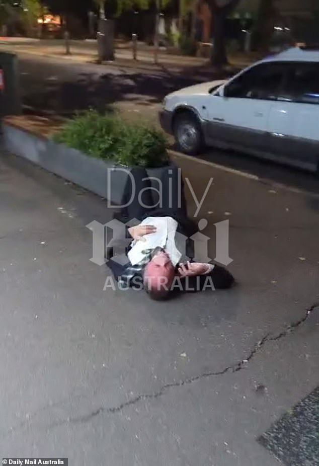 Natalie Abberfield said she hoped her ex-husband was okay. Above, she is seen lying on the ground in a video obtained exclusively by Daily Mail Australia.
