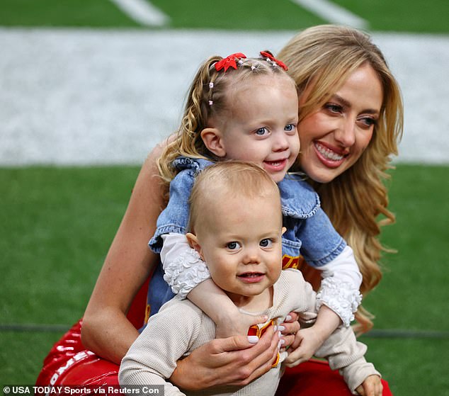 On the sidelines, she was also seen posing for photos with herself and Patrick's two children: daughter Sterling, almost three, and son Bronze, 15 months.