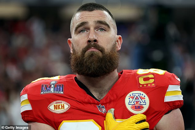 Travis Kelce performs the national anthem before appearing at his fourth Super Bowl