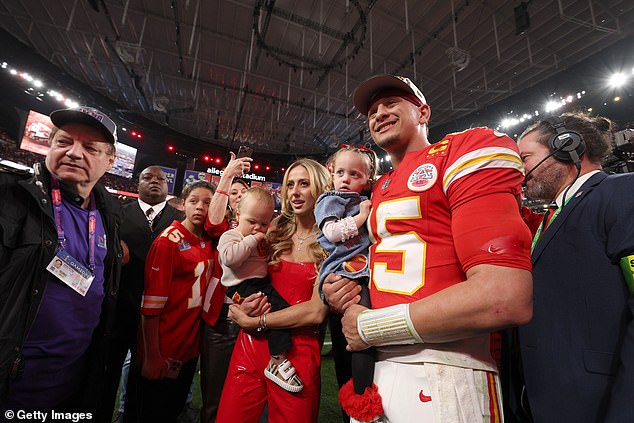 He also joined the quarterback, as well as some of his other teammates and coach Andy Reid, as they were presented with the Lombardi Trophy on a small stage set up on the field.