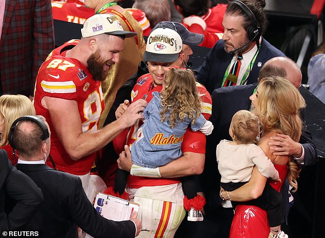 At one point, Travis Kelce, who is dating Taylor Swift and Brittany's new best friend, was seen sharing a handshake with Mahomes on stage and also had a sweet moment with the quarterback's daughter.