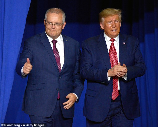 Scott Morrison is pictured with former US President Donald Trump, whom he described as a 