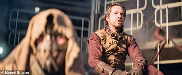 The mercenary continues to violently dispatch various attackers with both weapons and his trademark katanas, and Pyro, played by Aaron Stanford, comments: 