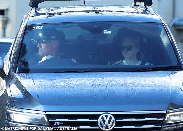 Morrison got behind the wheel of his Volkswagen while one of his daughters sat in the passenger seat as the couple left Kirribilli House on Saturday.