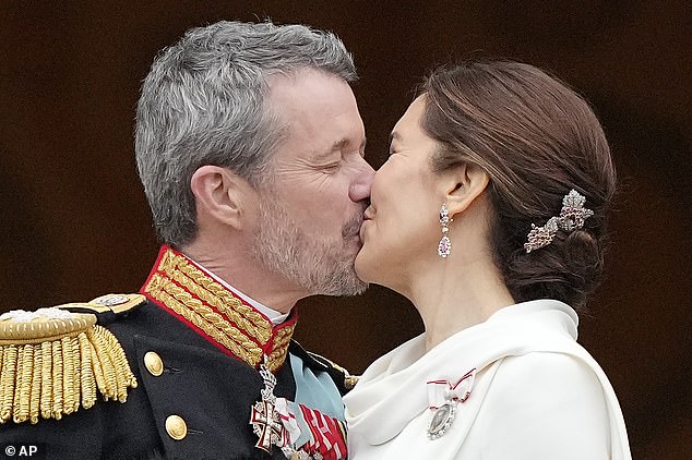 Maria was a vision dressed in white as she joined her husband on the balcony, shortly after Prime Minister Mette Frederiksen declared him King of Denmark.